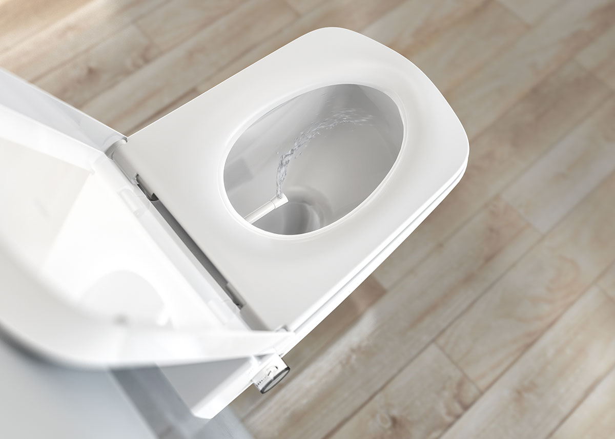Ovládání toalety je intuitivní – sprška je aktivována pouhým otočením pravého ovládacího panelu. Levá část slouží k nastavení teploty vody.