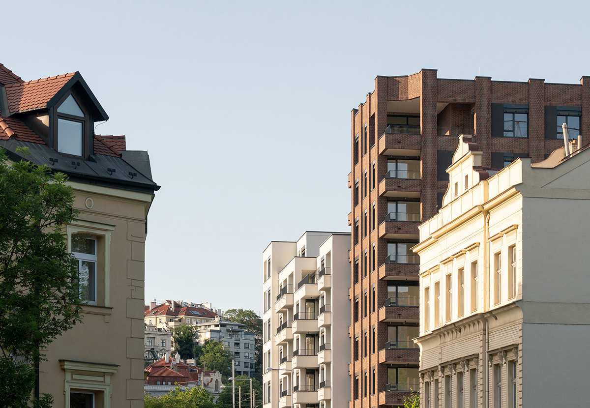 Nová rezidenční struktura pracuje s reinterpretací tradiční typologie a volně navazuje na strukturu čtvrti. 