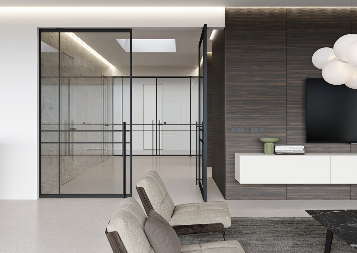 DIVA TRAVERTIN LATHO 2 RGB Skleněné interiérové dveře s černým hliníkovým rámem v moderním bytě